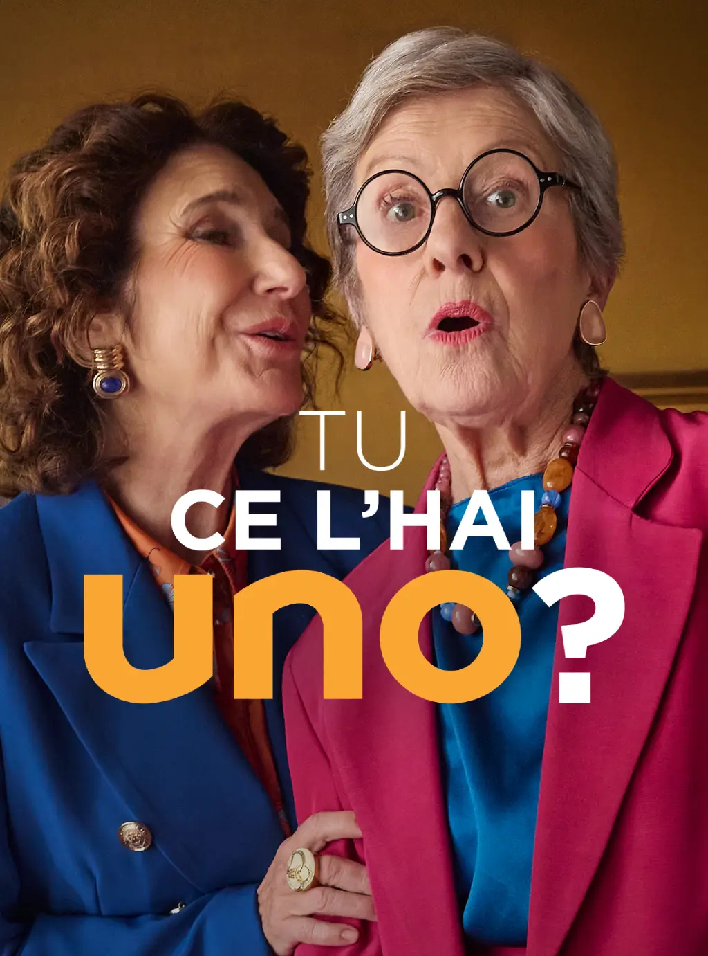Campagna pubblicitaria: Tu ce l'hai Uno? Due donne anziane. Una parla nell'orecchio dell'altra che appare sorpresa