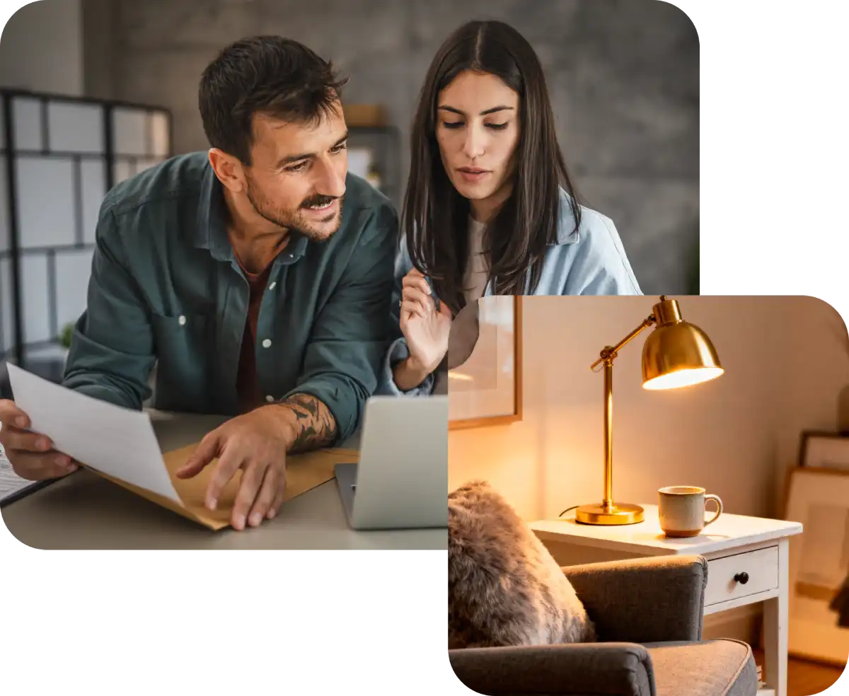 Coppia al laptop e con fogli in mano e luce su comodino